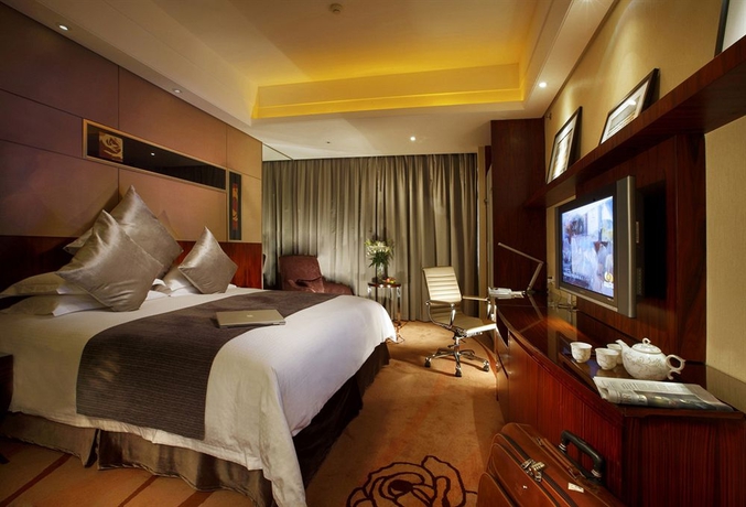 Imagen de la habitación del Hotel Yiwu Kingdom. Foto 4