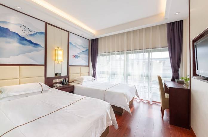 Imagen de la habitación del Hotel Yiwu Luck Bear. Foto 9