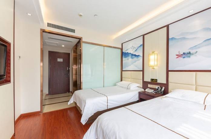 Imagen de la habitación del Hotel Yiwu Luck Bear. Foto 13