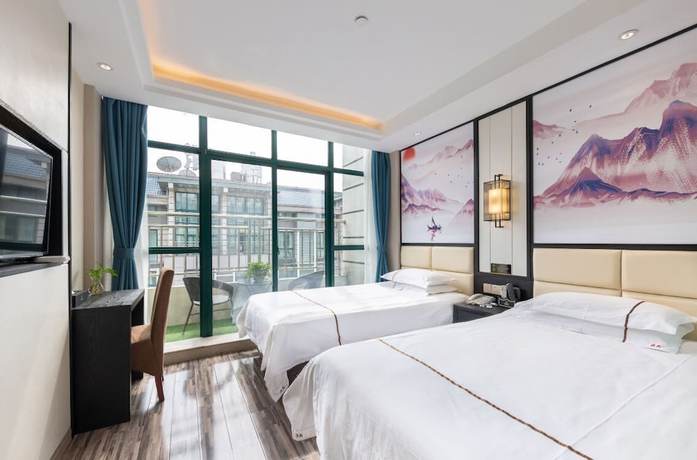Imagen de la habitación del Hotel Yiwu Luck Bear. Foto 14