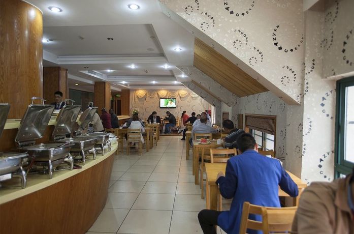 Imagen del bar/restaurante del Hotel Yiwu Luck Bear. Foto 2