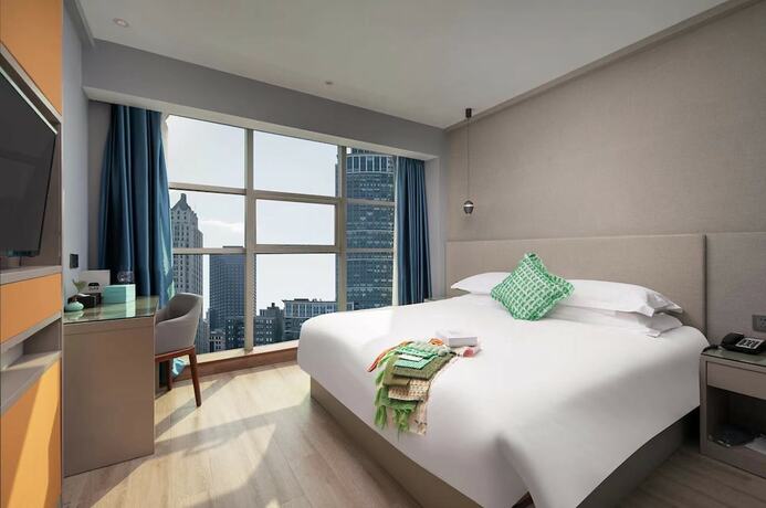 Imagen de la habitación del Hotel Yiwu Manting City. Foto 11