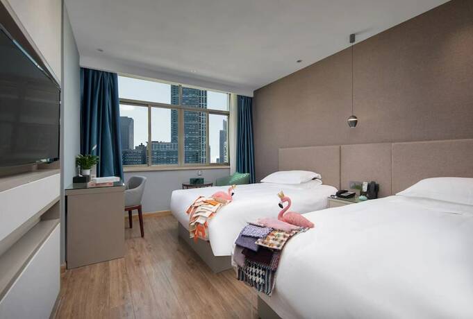 Imagen de la habitación del Hotel Yiwu Manting City. Foto 12