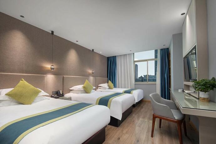 Imagen de la habitación del Hotel Yiwu Manting City. Foto 15
