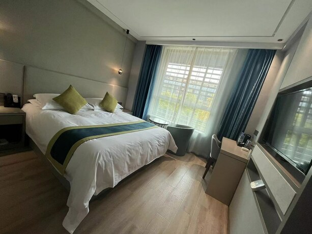 Imagen de la habitación del Hotel Yiwu Manting City. Foto 18