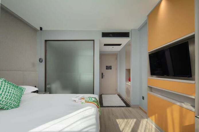 Imagen de la habitación del Hotel Yiwu Manting City. Foto 19