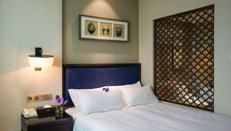 Imagen de la habitación del Hotel Yiwu Purey Kasion Hotel. Foto 4