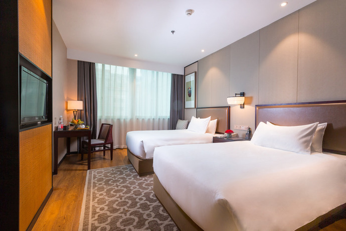 Imagen de la habitación del Hotel Yiwu Purey Kasion Hotel. Foto 12