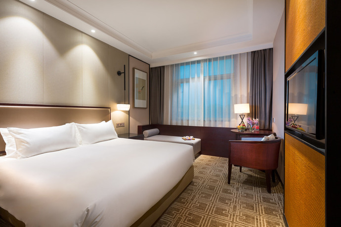 Imagen de la habitación del Hotel Yiwu Purey Kasion Hotel. Foto 13