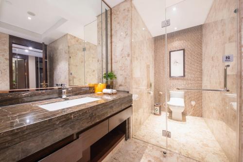 Imagen de la habitación del Hotel Yiwu Shangcheng. Foto 3