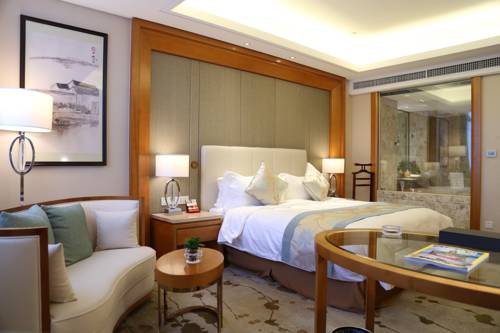 Imagen de la habitación del Hotel Yiwu Shangcheng. Foto 4