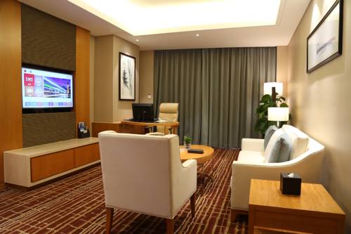 Imagen de la habitación del Hotel Yiwu Shangcheng. Foto 7