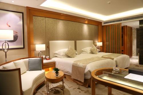 Imagen de la habitación del Hotel Yiwu Shangcheng. Foto 8