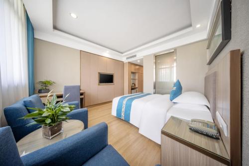 Imagen de la habitación del Hotel Yiwu Shangzhou - International Trade City. Foto 17