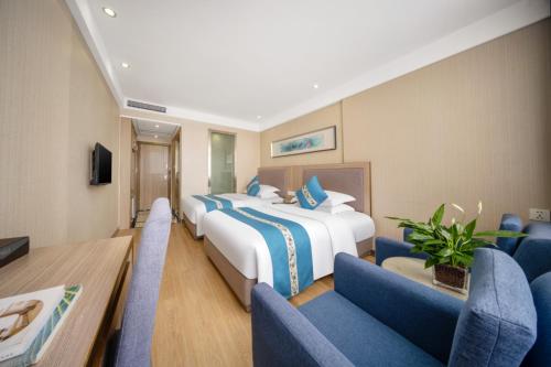 Imagen de la habitación del Hotel Yiwu Shangzhou - International Trade City. Foto 18