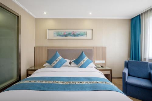 Imagen de la habitación del Hotel Yiwu Shangzhou - International Trade City. Foto 19