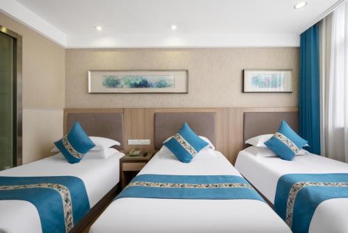 Imagen de la habitación del Hotel Yiwu Shangzhou - International Trade City. Foto 20