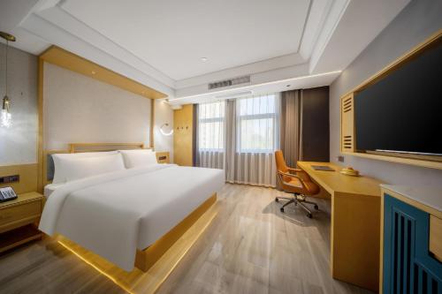 Imagen de la habitación del Hotel Yiwu WanYue International Holiday Inn. Foto 15