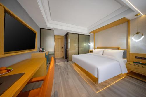 Imagen de la habitación del Hotel Yiwu WanYue International Holiday Inn. Foto 16