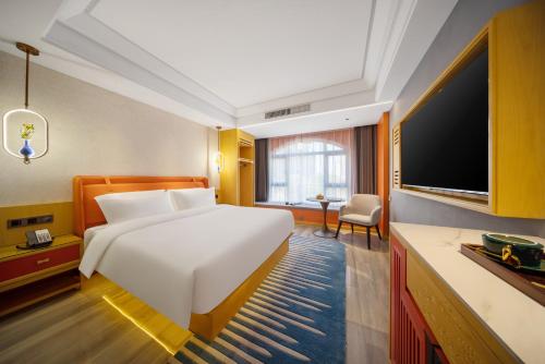 Imagen de la habitación del Hotel Yiwu WanYue International Holiday Inn. Foto 17