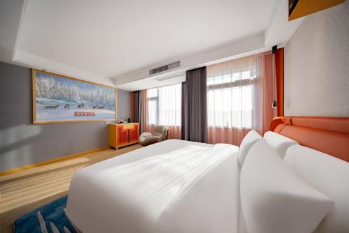 Imagen de la habitación del Hotel Yiwu WanYue International Holiday Inn. Foto 20