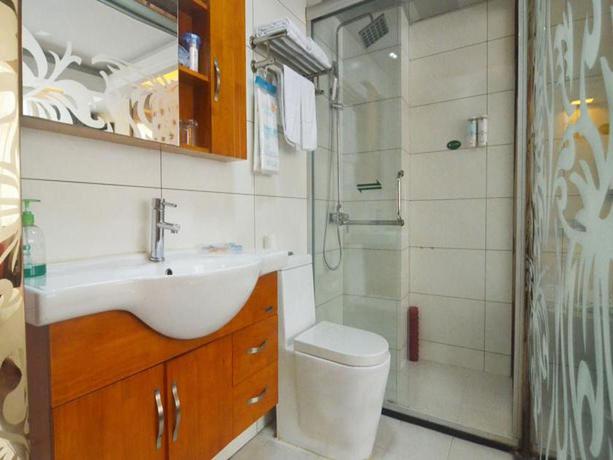 Imagen de la habitación del Hotel Yiwu Yuejia Business Hotel. Foto 11