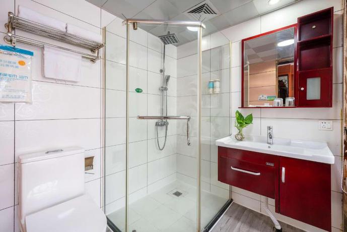 Imagen de la habitación del Hotel Yiwu Yuejia Business Hotel. Foto 12
