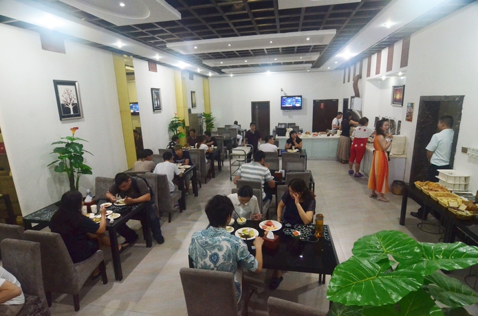 Imagen del bar/restaurante del Hotel Yiwu Yuejia. Foto 3