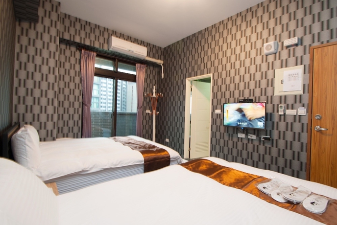 Imagen de la habitación del Hotel Yixiang Spring Travel. Foto 5