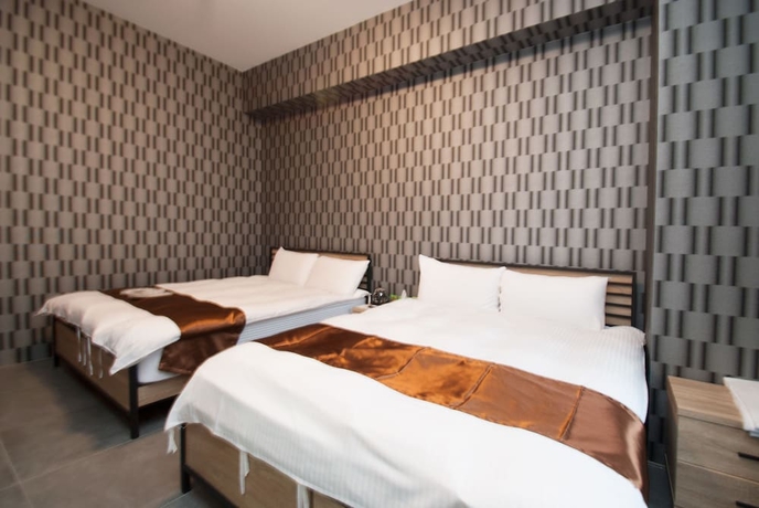 Imagen de la habitación del Hotel Yixiang Spring Travel. Foto 9