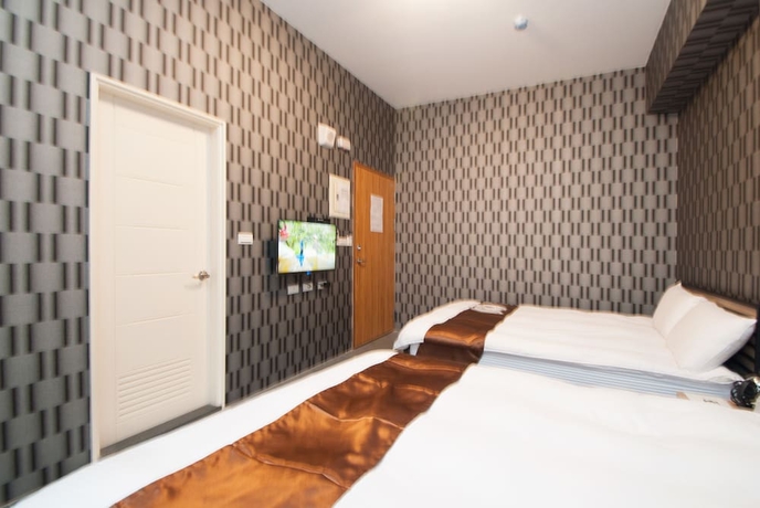 Imagen de la habitación del Hotel Yixiang Spring Travel. Foto 11
