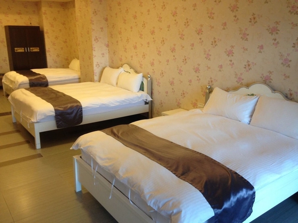 Imagen de la habitación del Hotel Yixiang Spring Travel. Foto 12