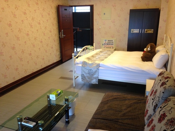 Imagen de la habitación del Hotel Yixiang Spring Travel. Foto 13