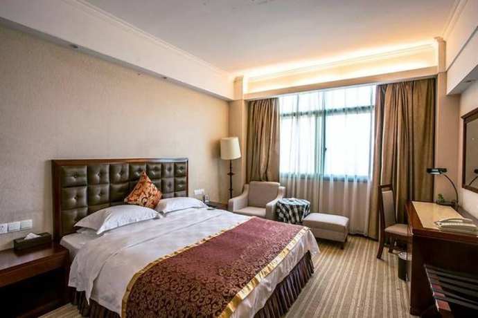 Imagen de la habitación del Hotel Yiyang Huatian. Foto 5