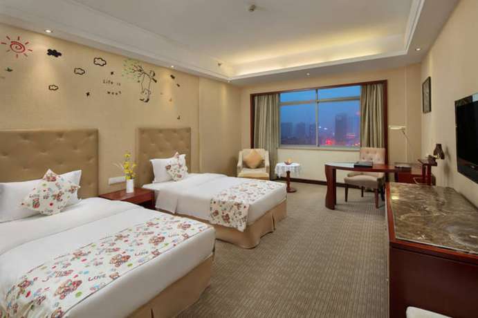 Imagen de la habitación del Hotel Yiyang Huatian. Foto 10