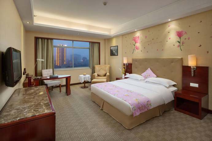 Imagen de la habitación del Hotel Yiyang Huatian. Foto 11