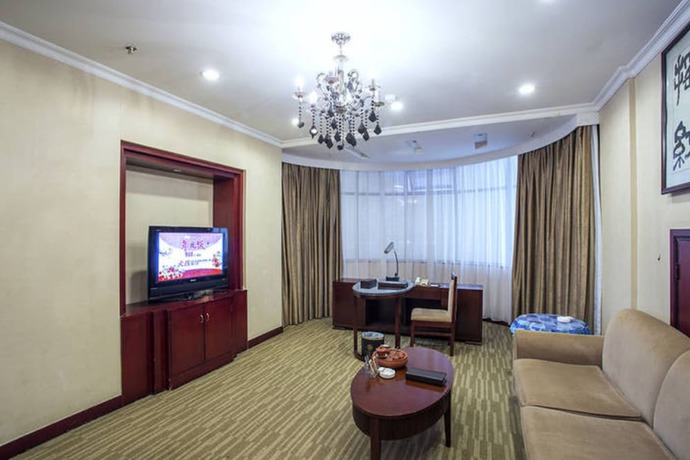 Imagen de la habitación del Hotel Yiyang Huatian. Foto 12