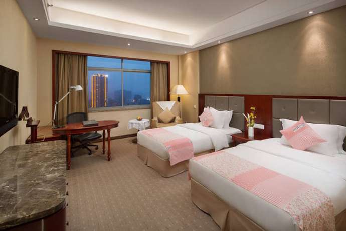 Imagen de la habitación del Hotel Yiyang Huatian. Foto 13