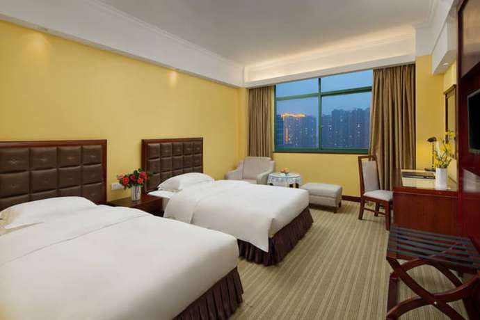 Imagen de la habitación del Hotel Yiyang Huatian. Foto 17