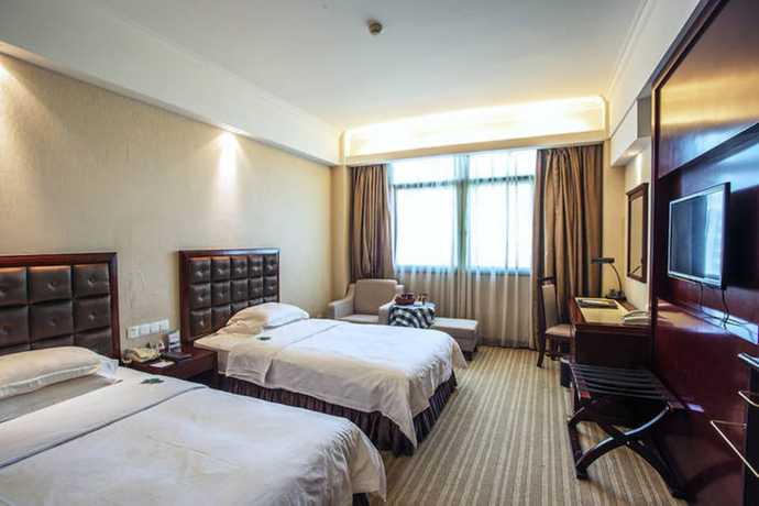 Imagen de la habitación del Hotel Yiyang Huatian. Foto 18