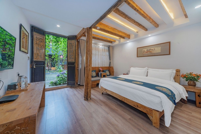 Imagen de la habitación del Hotel Yiyuan Snow Mountain View Historical Naxi House - Lijiang Old Town Mufu branch. Foto 2