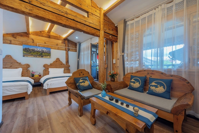 Imagen de la habitación del Hotel Yiyuan Snow Mountain View Historical Naxi House - Lijiang Old Town Mufu branch. Foto 5