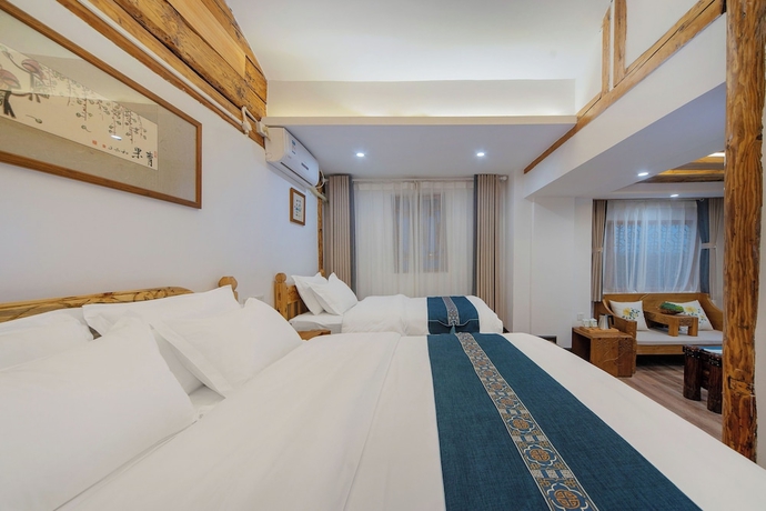 Imagen de la habitación del Hotel Yiyuan Snow Mountain View Historical Naxi House - Lijiang Old Town Mufu branch. Foto 6