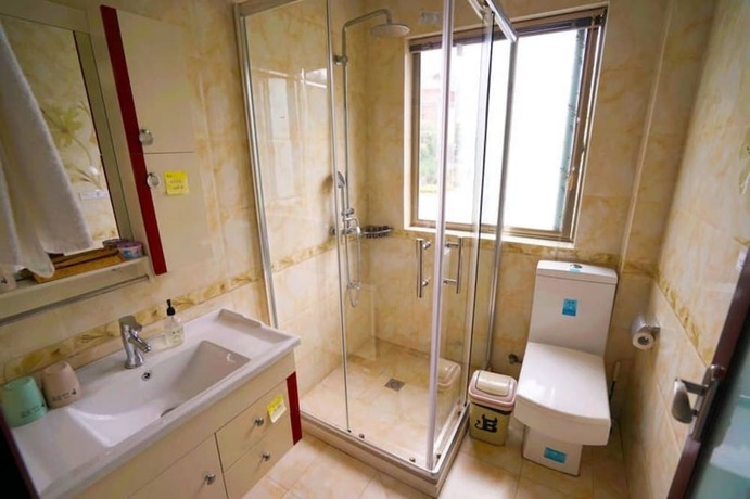 Imagen de la habitación del Hotel Yiyun Botique Inn Shuiyunjian Tonglu. Foto 13