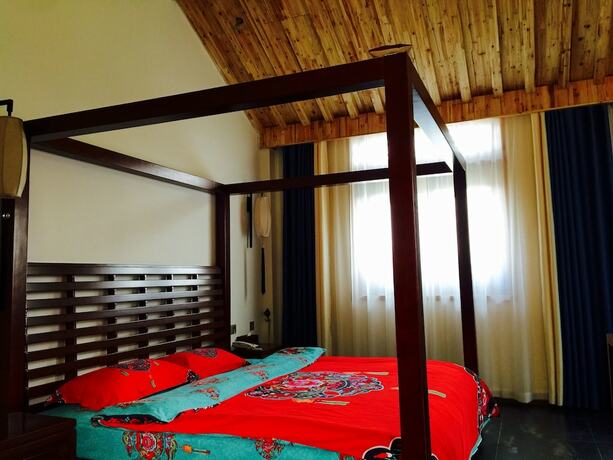 Imagen de la habitación del Hotel Yiyun Botique Inn Taierzhuang Old Town. Foto 12
