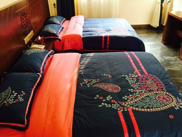 Imagen de la habitación del Hotel Yiyun Botique Inn Taierzhuang Old Town. Foto 13