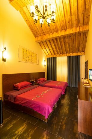 Imagen de la habitación del Hotel Yiyun Botique Inn Taierzhuang Old Town. Foto 17