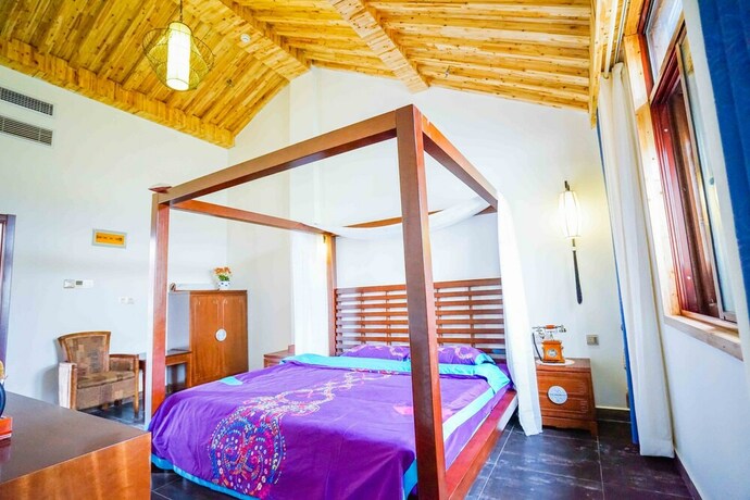 Imagen de la habitación del Hotel Yiyun Botique Inn Taierzhuang Old Town. Foto 18