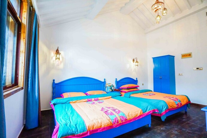 Imagen de la habitación del Hotel Yiyun Botique Inn Taierzhuang Old Town. Foto 19