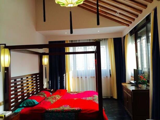 Imagen de la habitación del Hotel Yiyun Botique Inn Taierzhuang Old Town. Foto 20